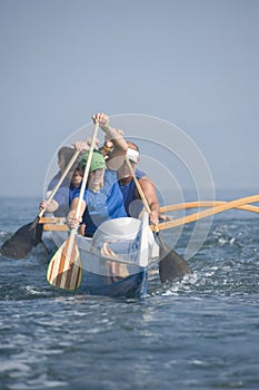 Outrigger Canoeing Team In Race