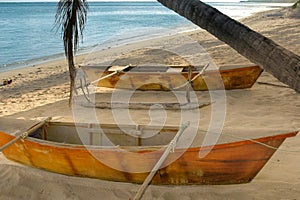 Outrigger canoes on the Beach