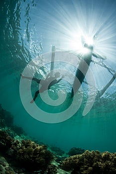 Outrigger and Young Fisherman