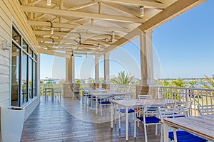 Outside dining at a tropical resort on a blue sky day