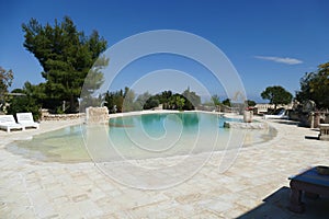 Outside infinity swimming pool in a luxury villa hotel