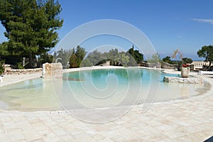 Outside infinity swimming pool in a luxury villa hotel