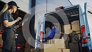 Outside of Logistics Distributions Warehouse: Diverse Team of Workers use Hand Truck Loading