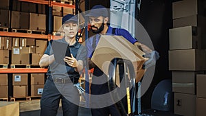 Outside of Logistics Distributions Warehouse With Inventory Manager Using Tablet Computer, talking