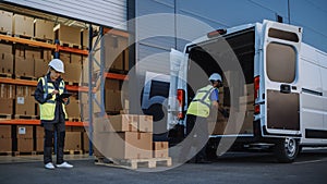 Outside of Logistics Distributions Warehouse With Inventory Manager Using Tablet Computer, talking