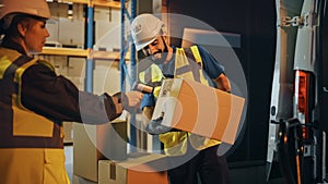 Outside of Logistics Retail Warehouse: Manager Using Tablet Computer and Scanner, talking to Worker