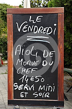 Outside menu sign for aioli photo