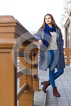 Outside portrait young woman in city streets