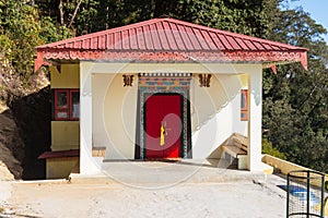 Outside small Temple room with pink hip roof in Guru Rinpoche Temple at Namchi. Sikkim, India photo