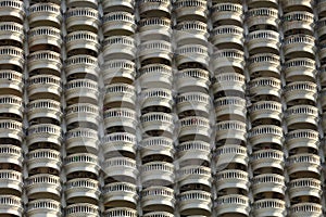 Outside view of apartment balcony in overpopulated city in urban downtown photo