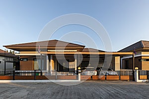 Outside view of the house with green fields against clear blue sky. Homes for Sale, Rent, Homes and Real Estate Concepts