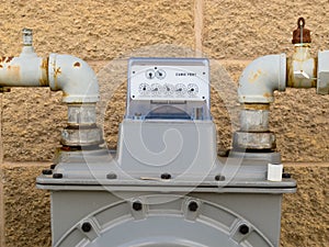 Outside wall natural gas meter dial display detail