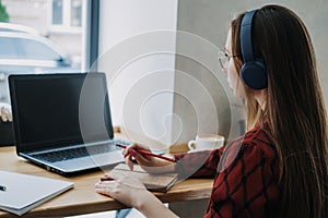 Outsourcing IT Projects, remote work, young professionals. female young programmer, developer working