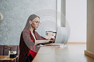 Outsourcing IT Projects, remote work, young professionals. female young programmer, developer working