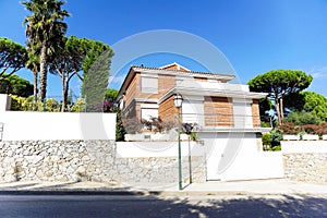 Outstanding mansion, with arch on the sea view shore at sunset