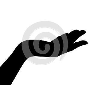 Outstretched right woman`s hand from the side with palm up. silhouette photo