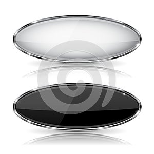 Oval black and white glass buttons with metal frame. With reflection