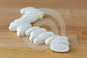 Oval Calcium Magnesium vitamin tablets to prevent osteoporosis,