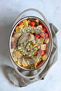 Oval cast iron stewpan with mixed vegetables