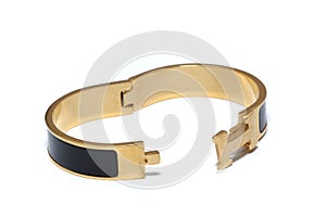 An oval ellipse stainless steel latch locking black gold bracelet bangle