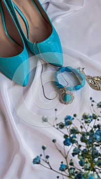 Oval handmade pendant with a turquoise stone in a silver frame, with a turquoise bracelet, silver earrings and turquoise