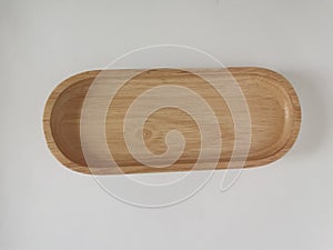 Oval plate madeâ€‹ fromâ€‹ rubber woodâ€‹