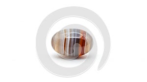 Oval shaped agate stone displayed against a white background
