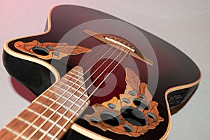 Ovation acoustic guitar in red product shot