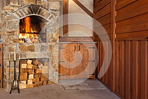 Oven with burning firewood for barbeque