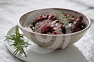 Oven Dried tomatoes with olive oil in a bowl