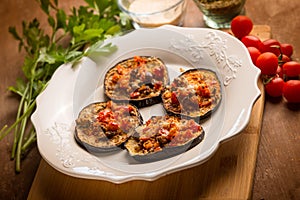 oven grated eggplants with fresh tomatoes