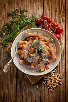 Oven pasta with sardines eggplants