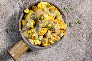 Oven Roasted Cauliflower in ceramic pot - Healthy food