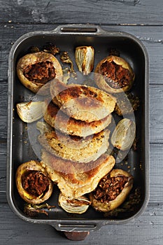 Oven tray with cordon bleu cutlets overhead