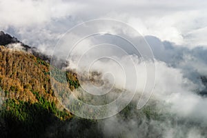 Over the clouds in high mountains, Pyrenees, foggy and cloudy