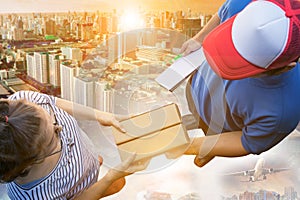 Over head shot of woman receive container card box from delivery