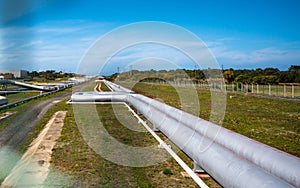 Over land gas pipeline system at natural gas station