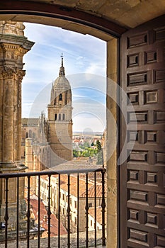 Over look New Cathedral Belltower of Salamanca through the doorframe