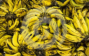 Over ripe bananas background in market,top view and defocus