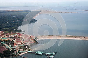 Over Singapore harbor on final approach to Changi Airport