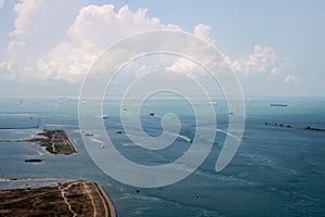 Over Singapore harbor on final approach to Changi Airport