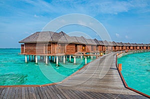 Over water bungalows on a tropical island, Maldives