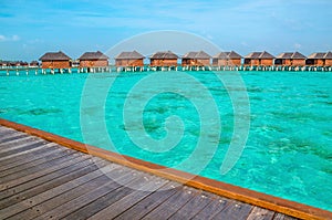 Over water bungalows on a tropical island, Maldives