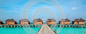 Over water bungalows on a tropical island, Maldives