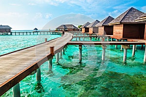 Over water bungalows on a tropical island, Maldives