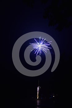 Over the water 4th of July fireworks at night