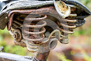 An overall partial close-up of an old rusty bicycle