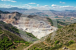 Overall view of limestone quarry near Calamorro mountain and Benalmadena town, Andalusia, Southern Spain.