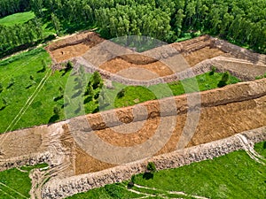 Overburden removal during sand pit preparation