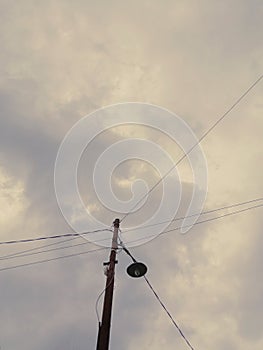 Overcast clouds and electricity poles